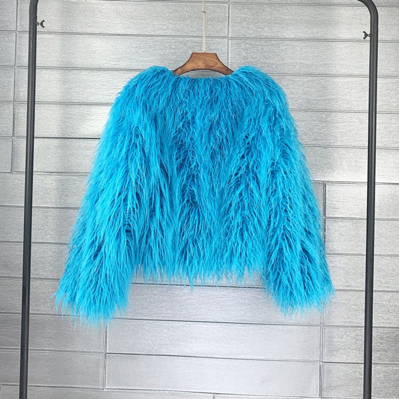 Women's shaggy faux fur jacket in turquoise – front view