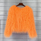 Women's shaggy faux fur jacket in orange – front view