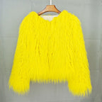 Women's shaggy faux fur jacket in yellow – front view