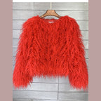 Women's shaggy faux fur jacket in red – front view