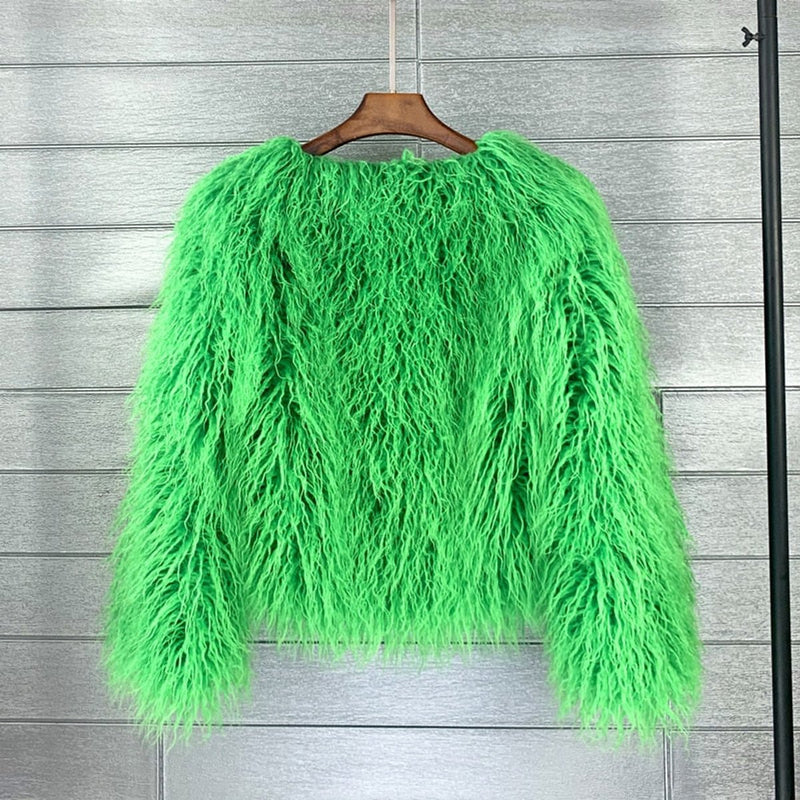 Women's shaggy faux fur jacket in green – front view
