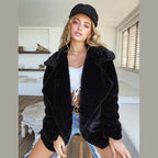 Women's short faux fur coat with lapel collar in black – front view