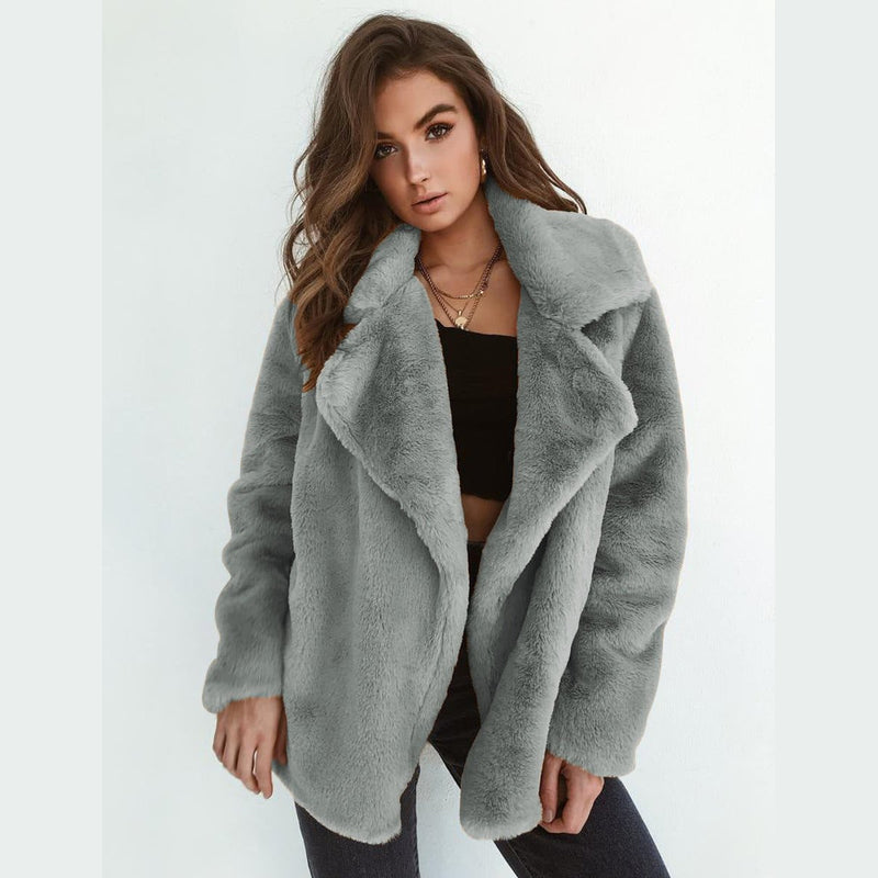 Women's short faux fur coat with lapel collar in gray – front view