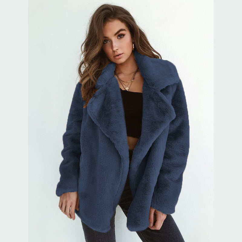 Women's short faux fur coat with lapel collar in navy blue – front view