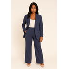 Woman wearing a navy blue tailored suit set
