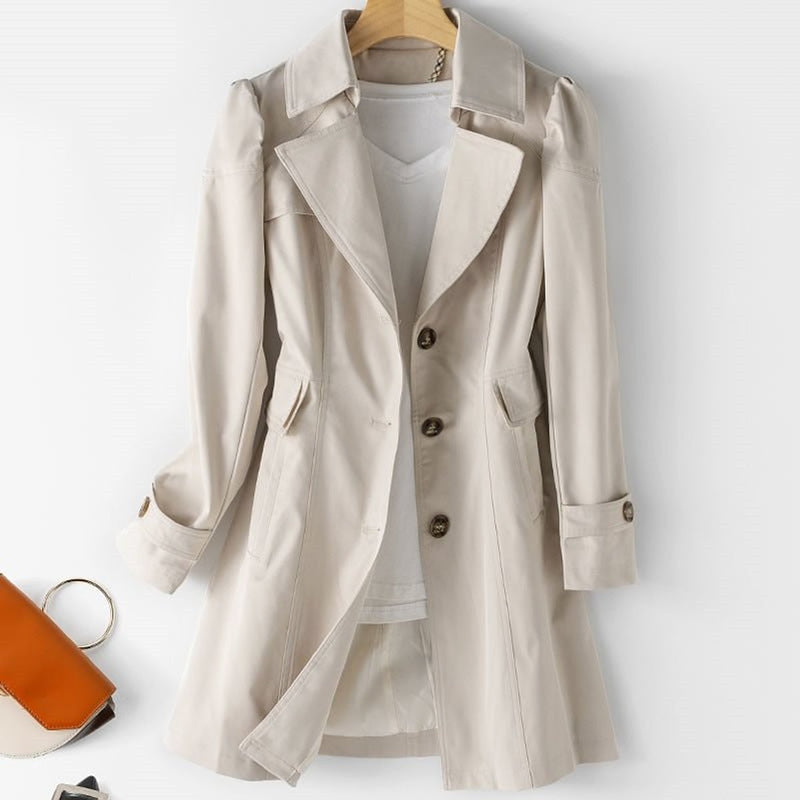 Women's tailored trench coat with lapel collar in beige – front view