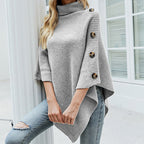 Women's turtleneck knit poncho with buttons in gray – front view