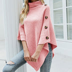 Women's turtleneck knit poncho with buttons in pink – front view